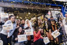 Celebration with confetti and signs.